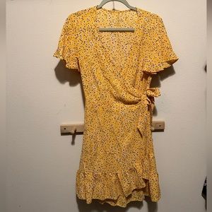 Size S yellow floral wrap dress. Brand new!